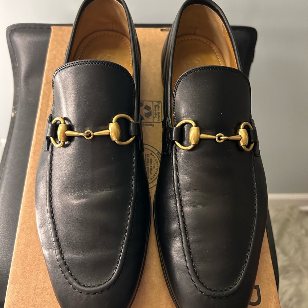 Gucci Black Leather Loafers with Gold Accents